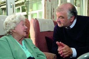 Professor Alan Sinclair talking to a care home resident with diabetes