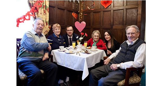 Residents at Stretton Hall enjoying a St Valentine’s Day themed afternoon tea