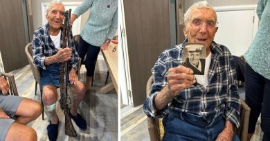 Veteran Signs WWII Rifle at Care Home in Bognor Regis